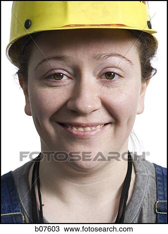 Female construction worker with hardhat View Large Photo Image Stock Image - Female construction worker with hardhat. Fotosearch