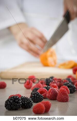 Fruit and cutting board View Large Photo Image Stock Photography - Fruit and cutting board. Fotosearch