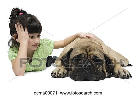 Stock Image - Girl and dog in relaxed position. Fotosearch