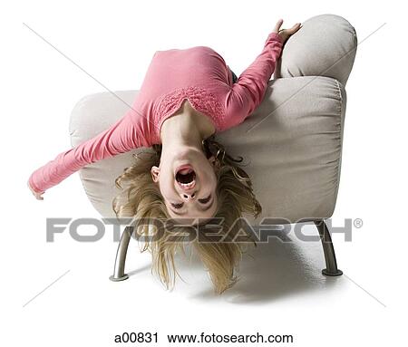 Girl bending backwards over couch View Large Photo Image Stock Image - Girl bending backwards over couch. Fotosearch