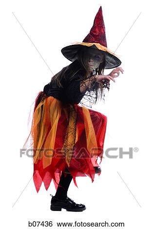 Girl dressed in a witch costume View Large Photo Image Stock Photograph - Girl dressed in a witch costume. Fotosearch