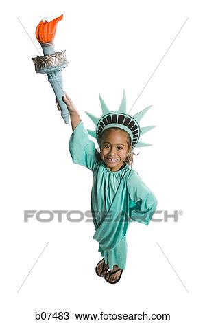 Girl dressed in Statue of Liberty costume View Large Photo Image Stock Image - Girl dressed in Statue of Liberty costume. Fotosearch