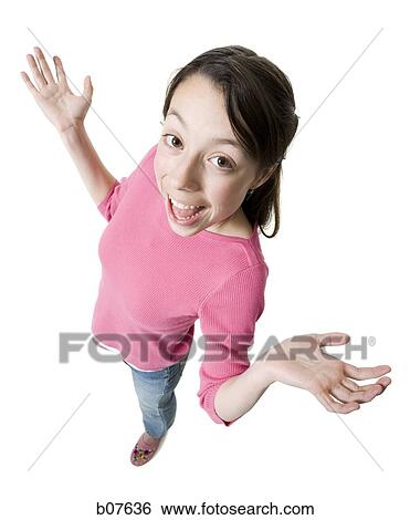 Girl gesturing with her hands in the air View Large Photo Image Stock Photograph - Girl gesturing with her hands in the air. Fotosearch