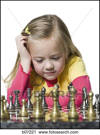 Girl playing chess View Large Photo Image Stock Image - Girl playing chess. Fotosearch