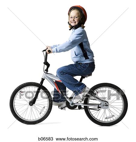 Stock Image - Girl riding bicycle. Fotosearch