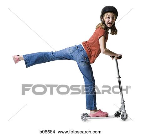 Picture - Girl riding scooter. Fotosearch
