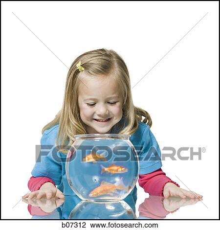 Girl with goldfish and bowl View Large Photo Image Stock Image - Girl with goldfish and bowl. Fotosearch