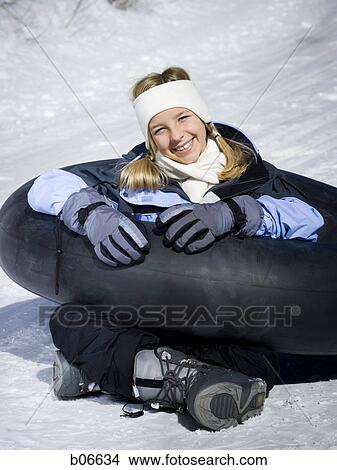 Picture - Girl with inner tube. Fotosearch