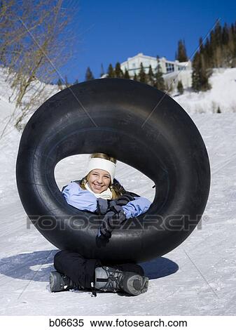 Girl with inner tube View Large Photo Image Stock Photography - Girl with inner tube. Fotosearch