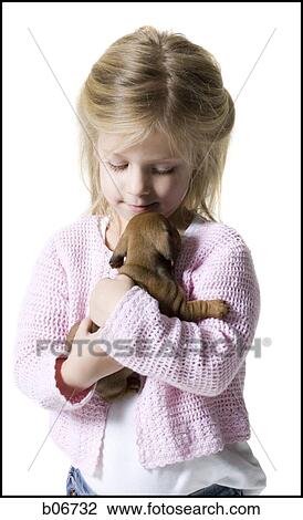 Girl with small puppy View Large Photo Image Stock Image - Girl with small puppy. Fotosearch