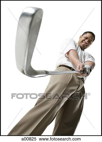 Golfer swinging club View Large Photo Image Stock Photography - Golfer swinging club. Fotosearch