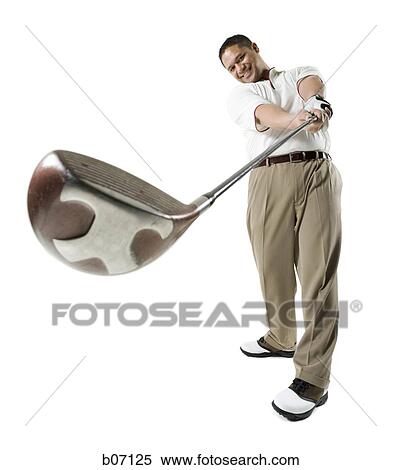 Stock Photography - Golfer swinging club. Fotosearch