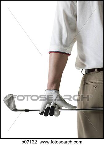 Stock Image - Golfer with club. Fotosearch