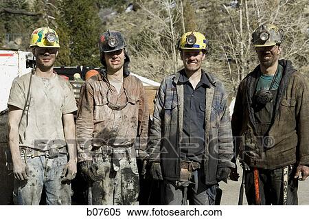 Group of four miners View Large Photo Image Stock Photography - Group of four miners. Fotosearch