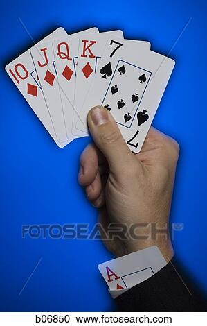 Hand holding poker hand View Large Photo Image Stock Image - Hand holding poker hand. Fotosearch