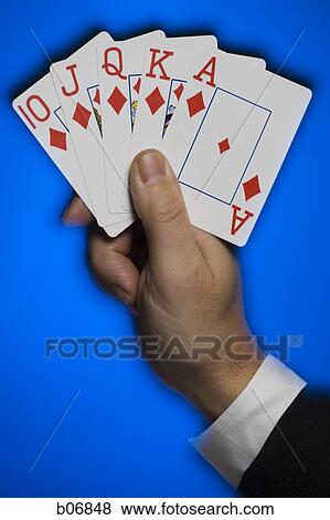 Hand holding poker hand View Large Photo Image Stock Photo - Hand holding poker hand. Fotosearch