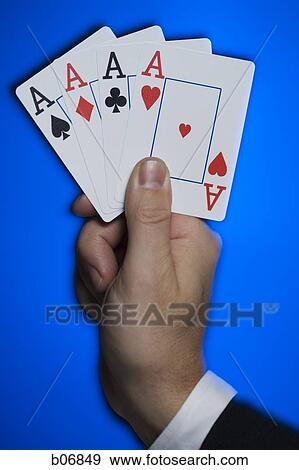 Hand holding poker hand View Large Photo Image Stock Photo - Hand holding poker hand. Fotosearch
