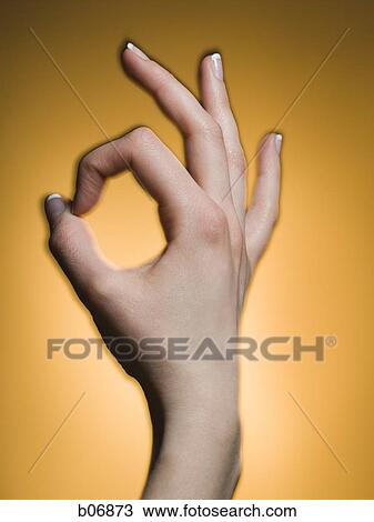 Hand making okay gesture View Large Photo Image Stock Image - Hand making okay gesture. Fotosearch