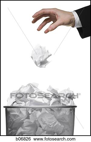 Hand tossing paper into trash can View Large Photo Image Stock Photograph - Hand tossing paper into trash can. Fotosearch