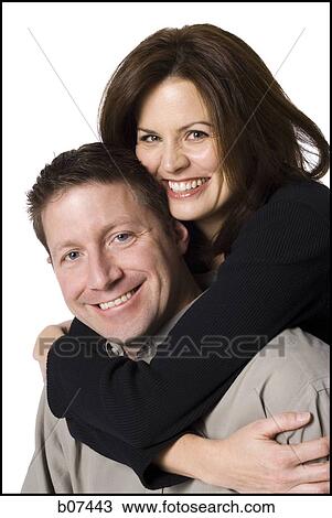 Happy husband and wife posing View Large Photo Image Stock Image - Happy husband and wife posing. Fotosearch