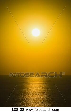 Hazy sun overlooking ocean View Large Photo Image Stock Photo - Hazy sun overlooking ocean. Fotosearch