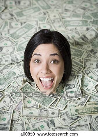 Head of woman emerging from dollar bills View Large Photo Image Stock Image - Head of woman emerging from dollar bills. Fotosearch
