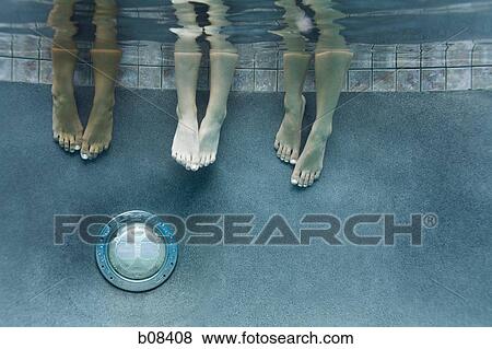 Low section view of three teenage girls feet in a swimming pool View Large Photo Image Stock Photo - Low section view of three teenage girls feet in a swimming pool. Fotosearch