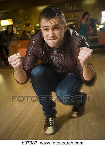 Male bowler celebrating a strike View Large Photo Image Stock Photo - Male bowler celebrating a strike. Fotosearch