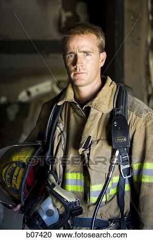 Male firefighter View Large Photo Image Stock Image - Male firefighter. Fotosearch