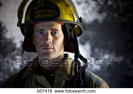 Stock Photo - Male firefighter. Fotosearch