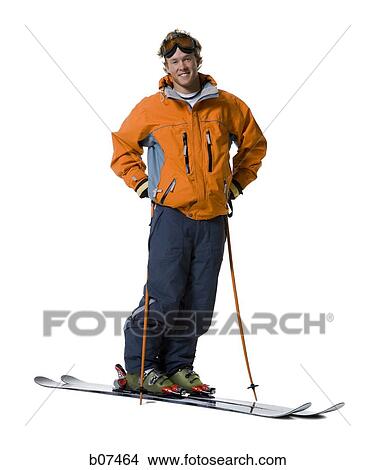 Male skier in orange ski jacket View Large Photo Image Picture - Male skier in orange ski jacket. Fotosearch