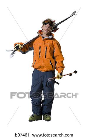 Male skier in orange ski jacket View Large Photo Image Stock Image - Male skier in orange ski jacket. Fotosearch