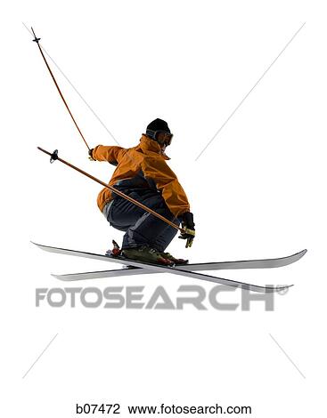 Male skier in orange ski jacket View Large Photo Image Stock Image - Male skier in orange ski jacket. Fotosearch