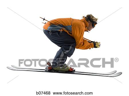 Male skier in orange ski jacket View Large Photo Image Stock Photo - Male skier in orange ski jacket. Fotosearch