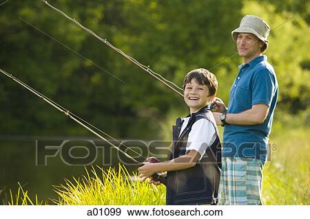 Man and his son fishing View Large Photo Image Stock Photo - Man and his son fishing. Fotosearch