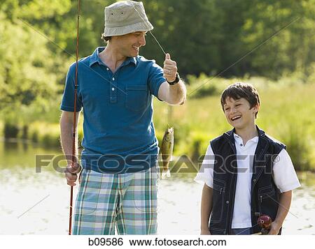 man and his son fishing View Large Photo Image Stock Photograph - man and his son fishing. Fotosearch