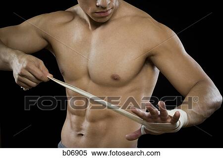 Man bandaging hand View Large Photo Image Stock Photography - Man bandaging hand. Fotosearch