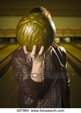 Man bowling in alley View Large Photo Image Picture - Man bowling in alley. Fotosearch