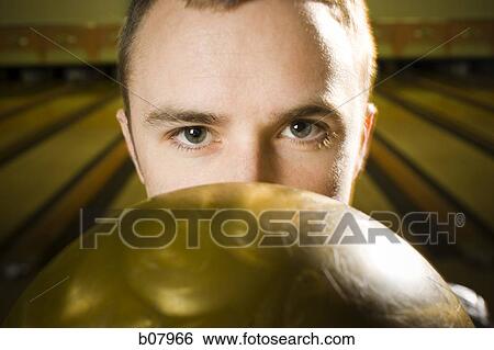 Man bowling in alley View Large Photo Image Stock Photograph - Man bowling in alley. Fotosearch