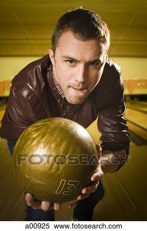 Man bowling in alley View Large Photo Image Stock Photography - Man bowling in alley. Fotosearch