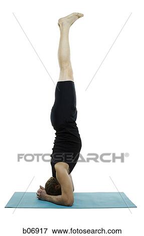 Man doing yoga View Large Photo Image Stock Photo - Man doing yoga. Fotosearch