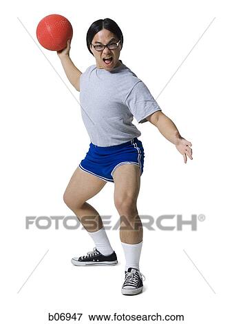 Man holding about to throw ball View Large Photo Image Stock Photo - Man holding about to throw ball. Fotosearch