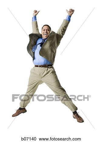 Man jumping with outstretched arms View Large Photo Image Stock Image - Man jumping with outstretched arms. Fotosearch