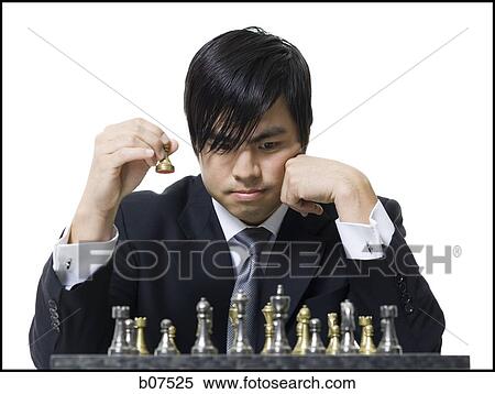 Man playing chess View Large Photo Image Stock Photography - Man playing chess. Fotosearch