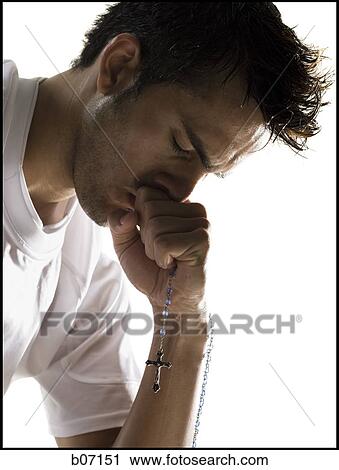 Man praying View Large Photo Image Stock Image - Man praying. Fotosearch
