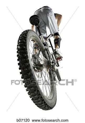 Man riding mountain bike View Large Photo Image Stock Image - Man riding mountain bike. Fotosearch