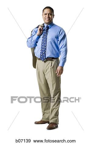 Man standing holding jacket over shoulder View Large Photo Image Stock Photo - Man standing holding jacket over shoulder. Fotosearch