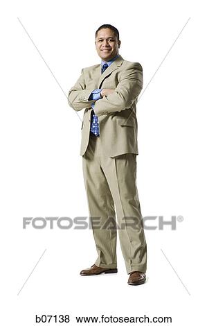 Man standing with arms crossed View Large Photo Image Stock Photo - Man standing with arms crossed. Fotosearch