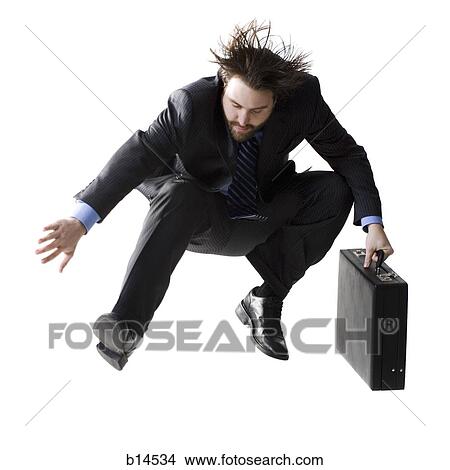 Man with briefcase leaping View Large Photo Image Picture - Man with briefcase leaping. Fotosearch