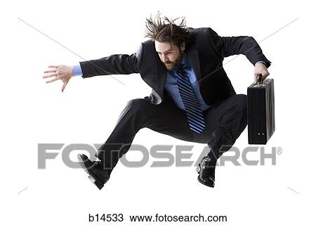 Man with briefcase leaping View Large Photo Image Stock Image - Man with briefcase leaping. Fotosearch